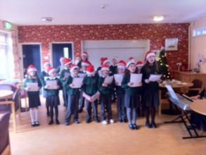Choir sings Christmas Carols for Roxborough House